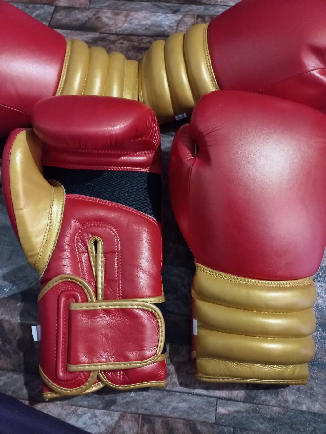 Red and gold boxing gloves